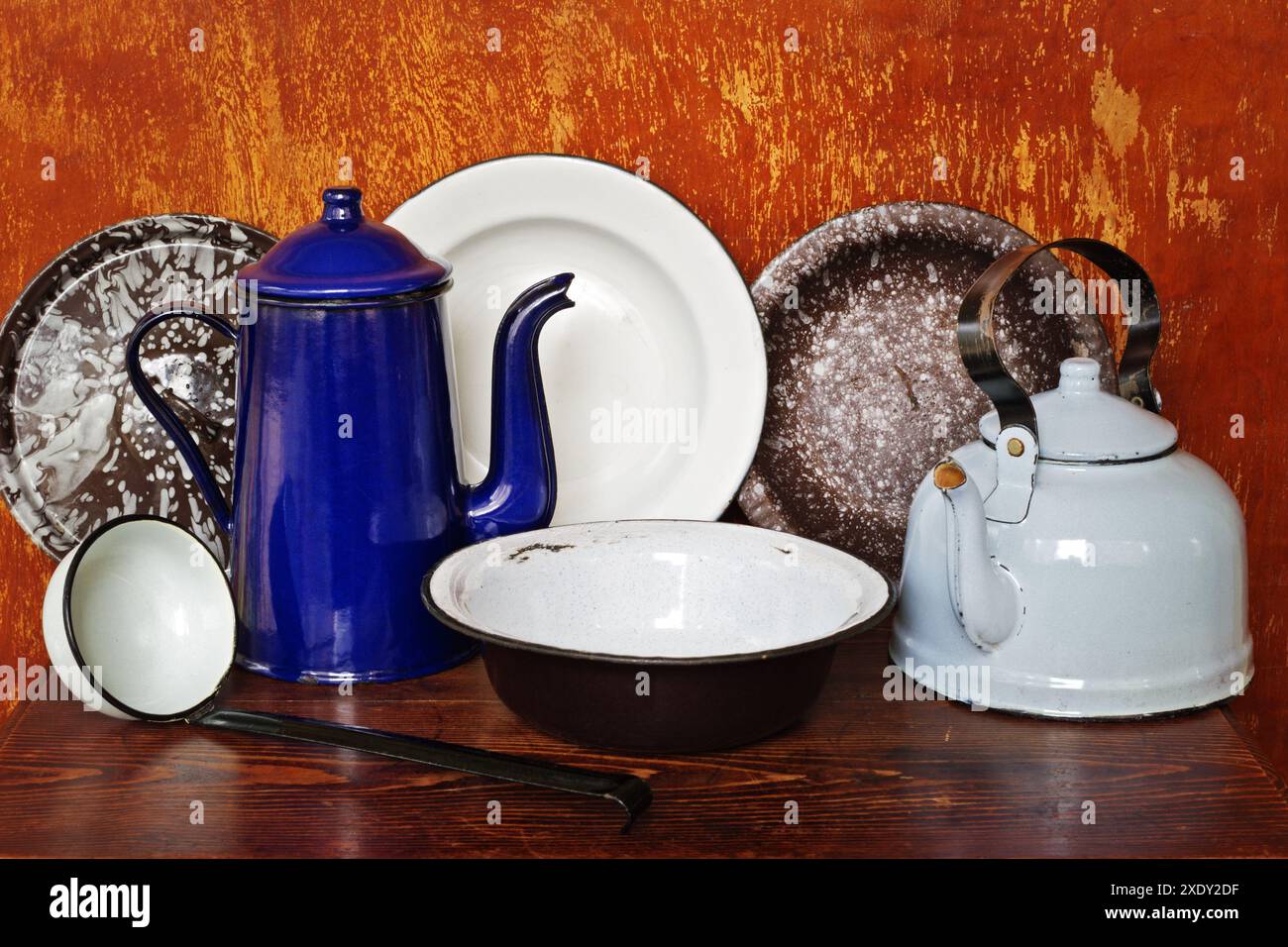 Vintage enameled kitchen utensils Stock Photo - Alamy