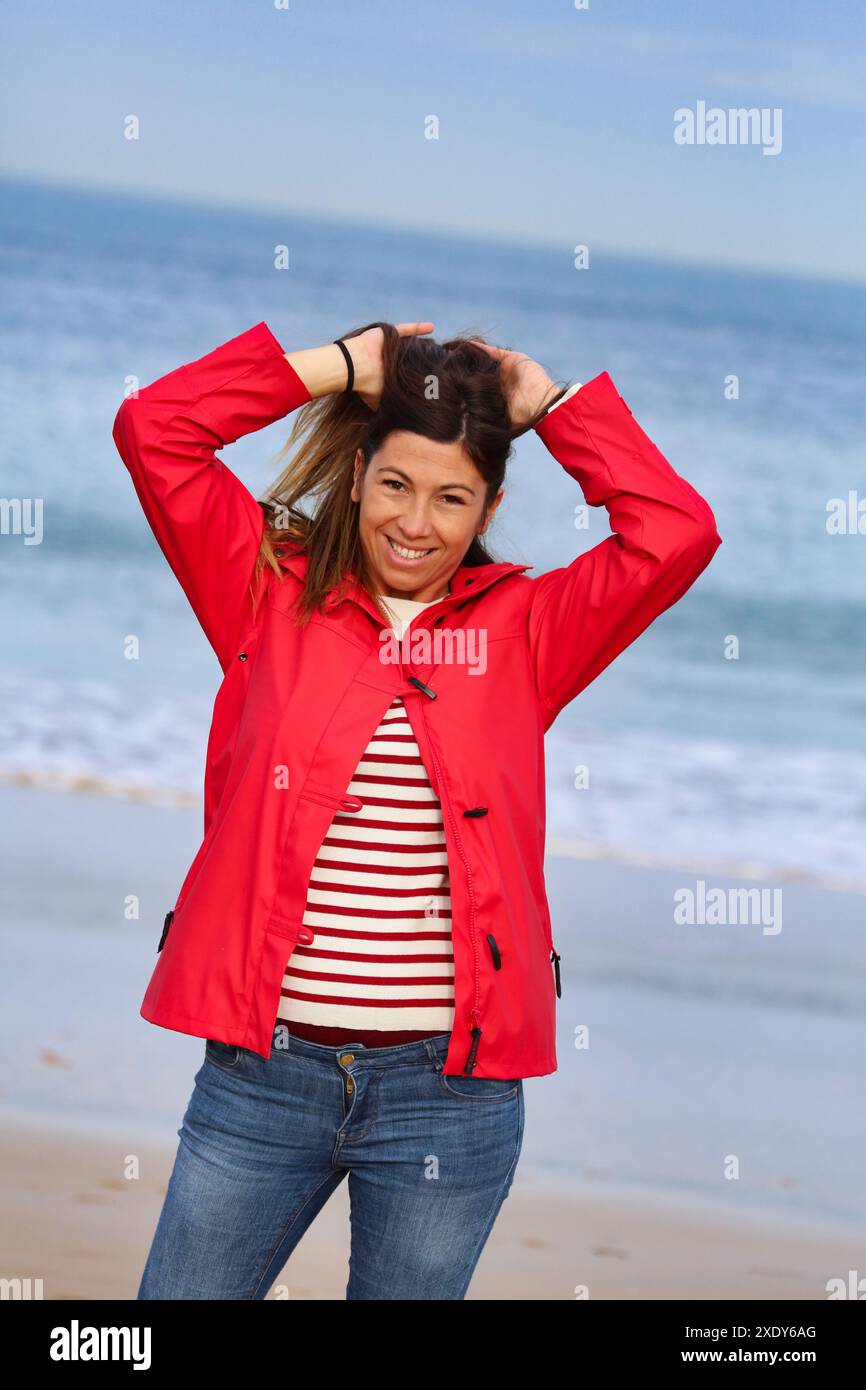 Long haired woman on beach hi-res stock photography and images - Alamy