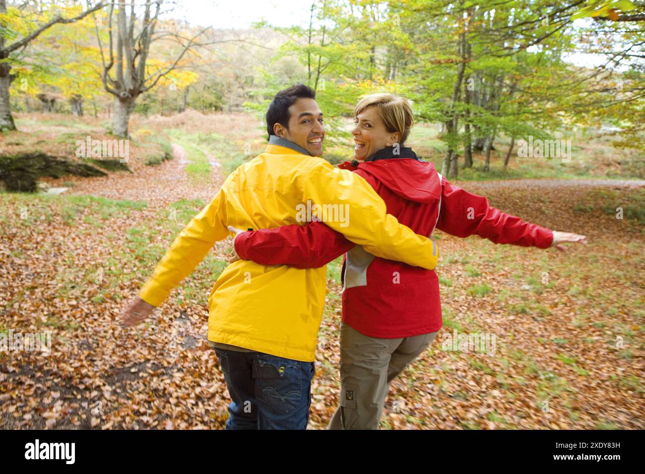 Couple fun run in forest hi-res stock photography and images - Alamy