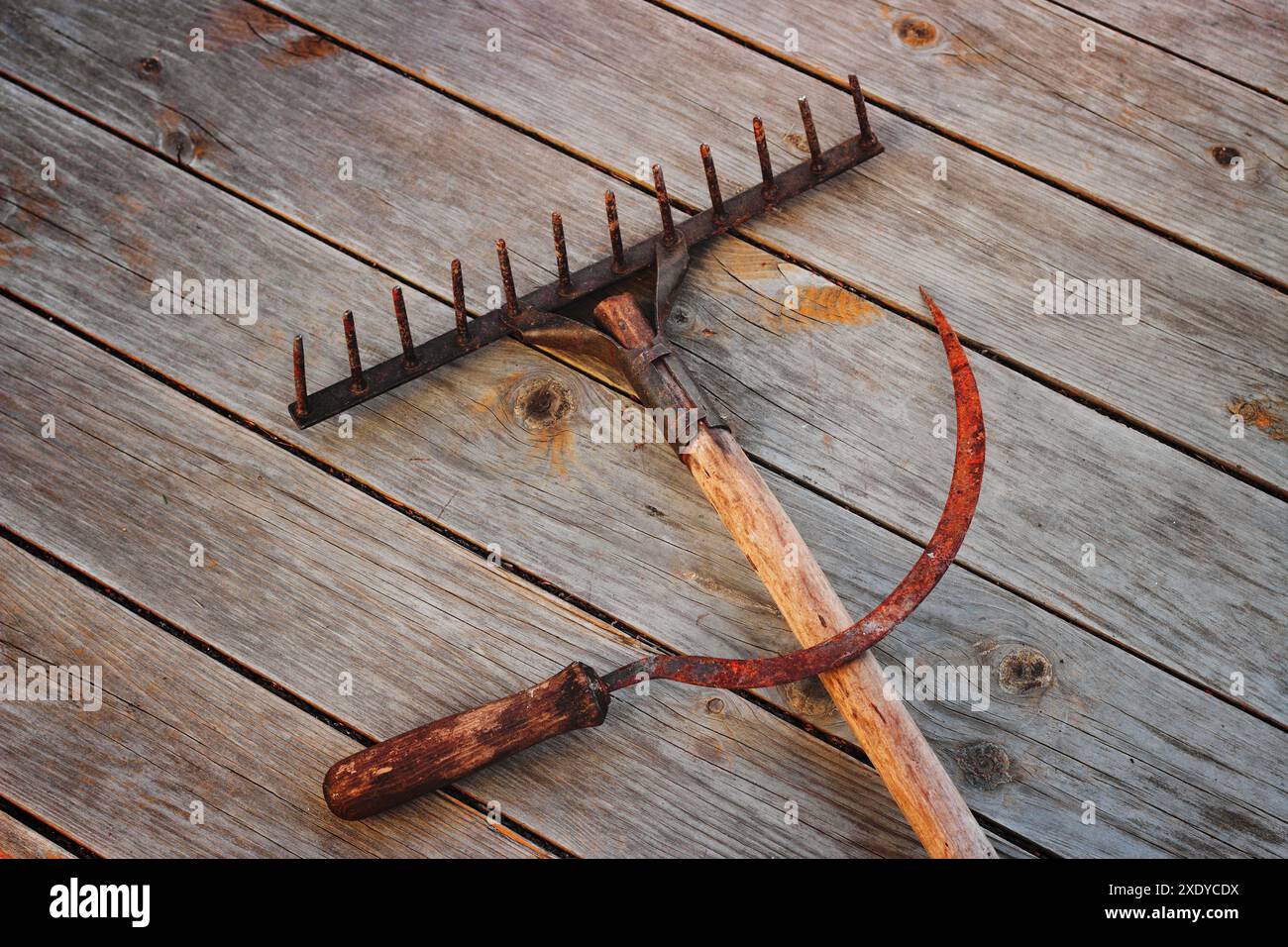 Sickle and a rake Stock Photo - Alamy