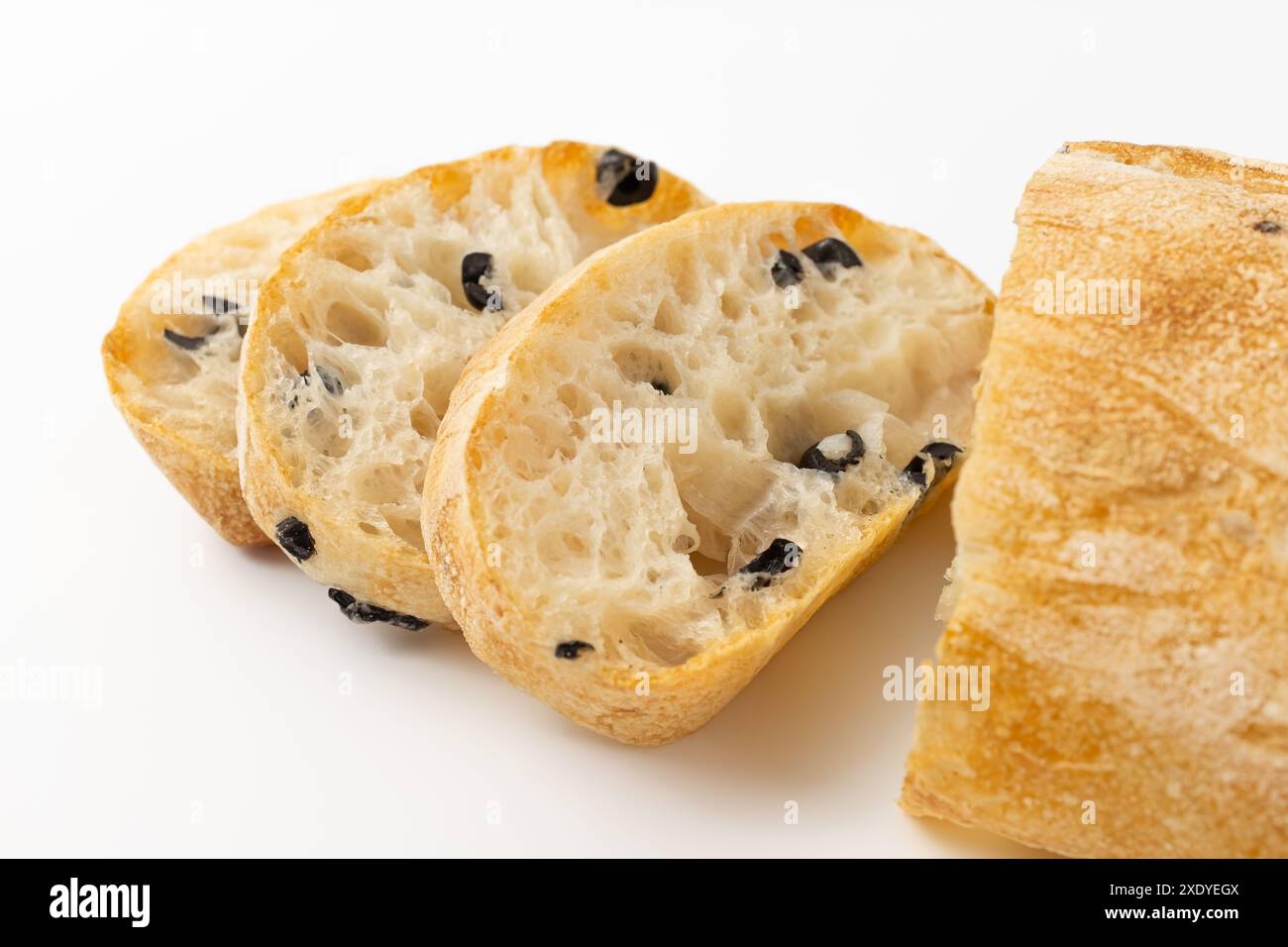 Olive ciabatta on a white background Stock Photo - Alamy