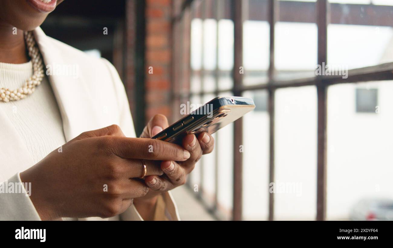 Businesswoman working using smartphone hi-res stock photography and ...