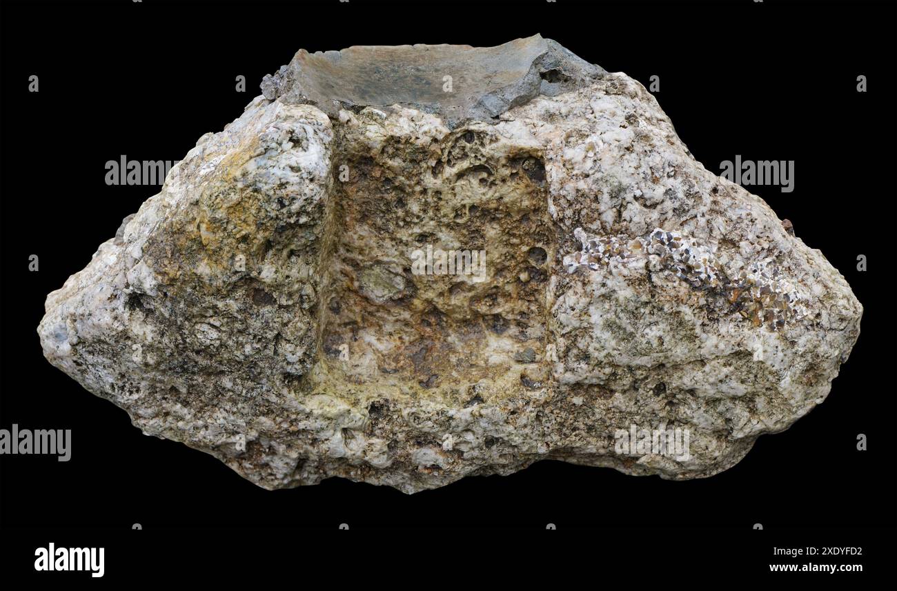A broken piece of an old concrete wall  isolated black Stock Photo