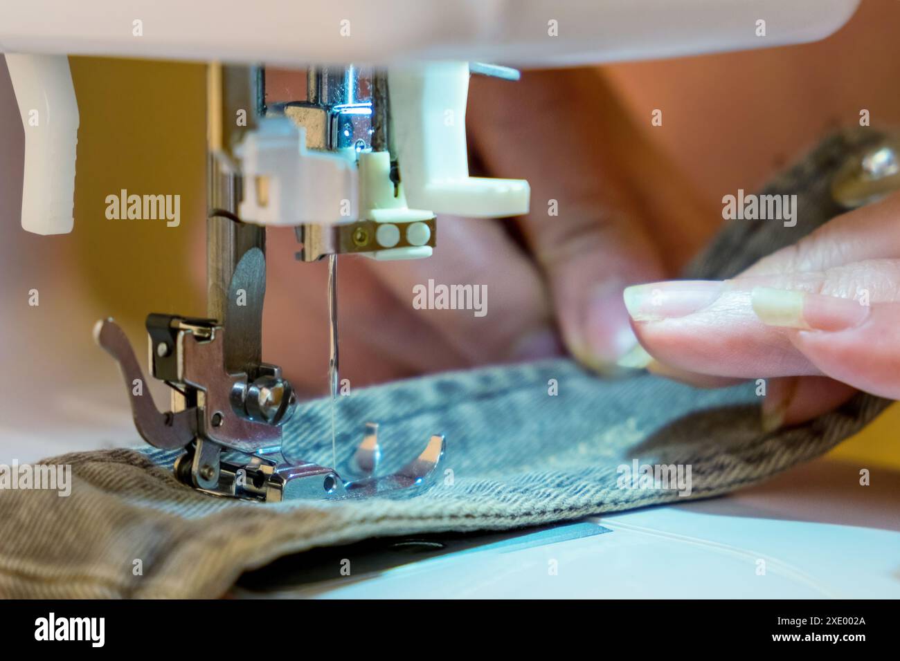 Closeup woman sewing machine hi-res stock photography and images - Alamy