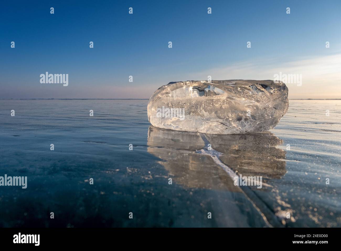 Sunlight refracted in piece of ice Stock Photo