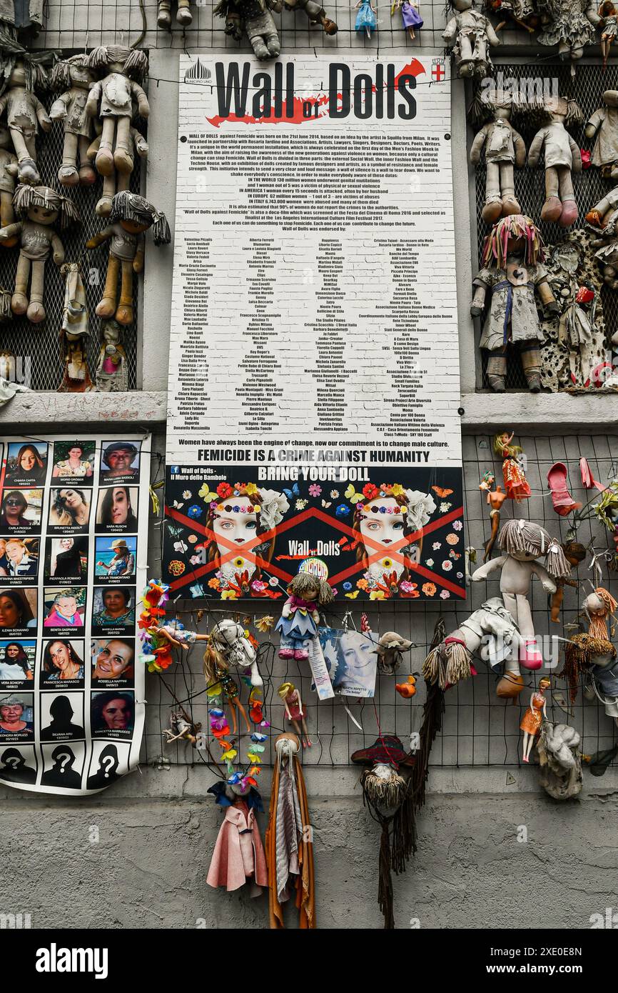 Wall of Dolls, an artistic installation became a symbol against feminicides and violence against women, in the central Via de Amicis, Milan, Italy Stock Photo