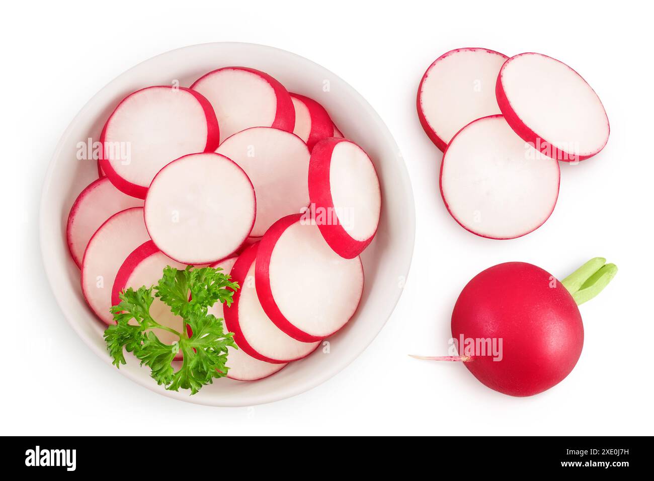 Radish slices in ceramic bowl isolated on white background. Top view. Flat lay Stock Photo