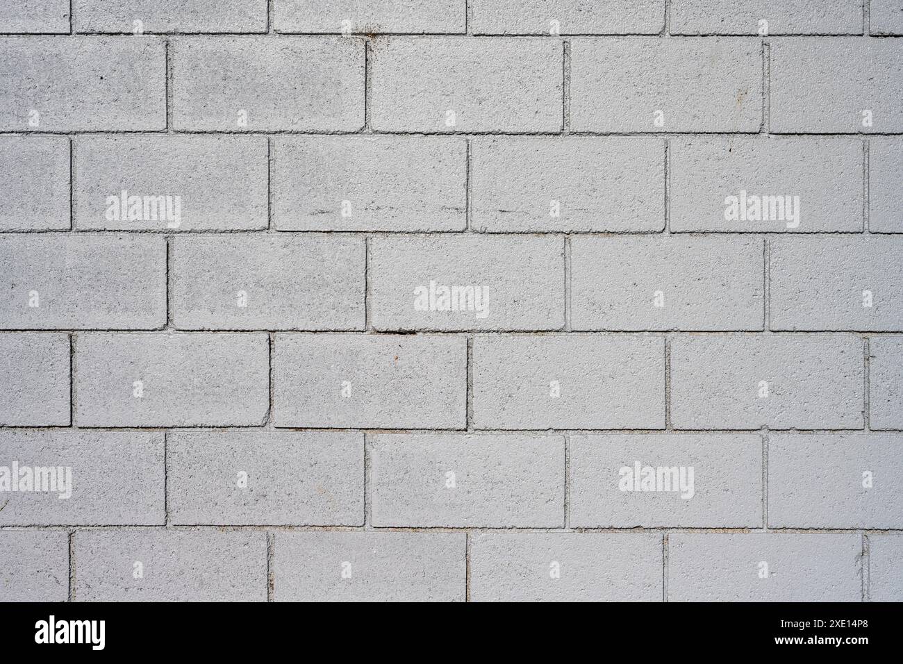 Background from a painted gray stone wall Stock Photo