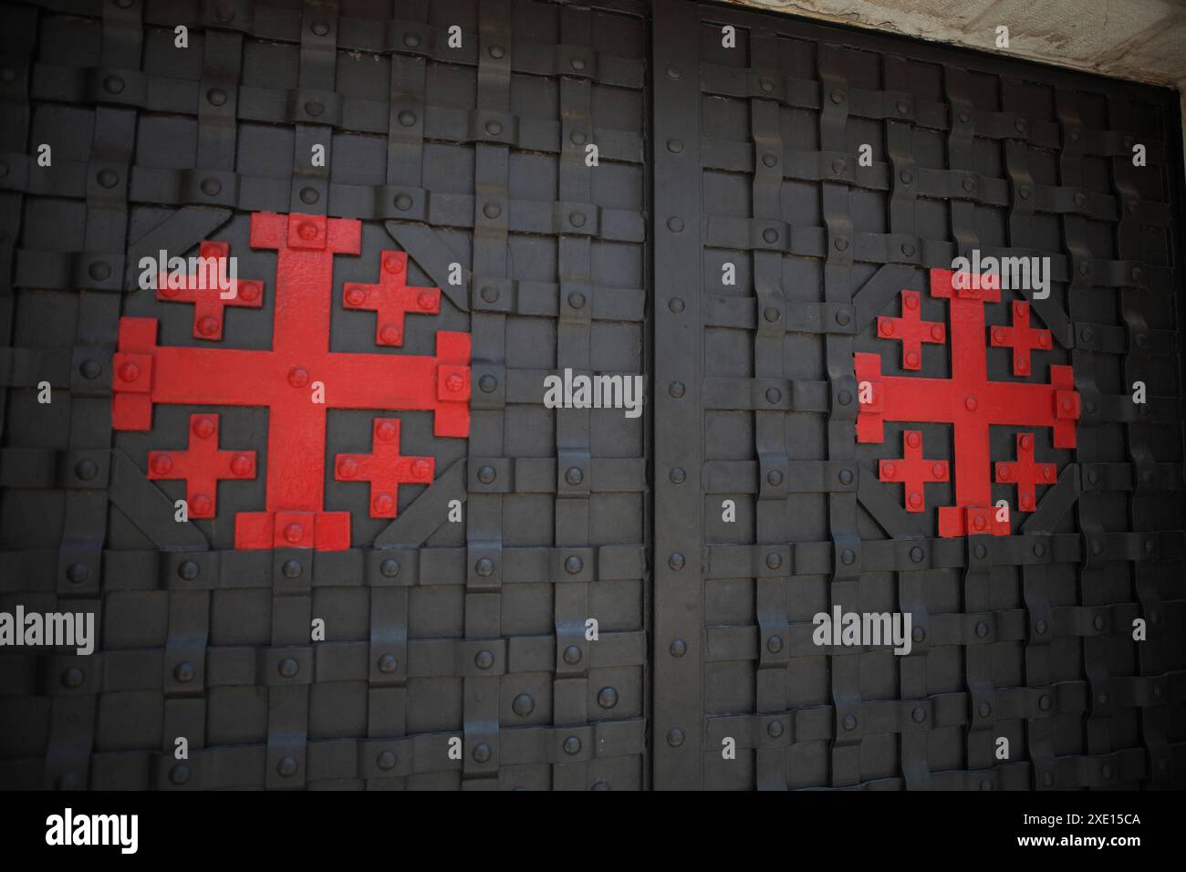 Jerusalem Cross, Cross of the Holy Land on the door to Garden of