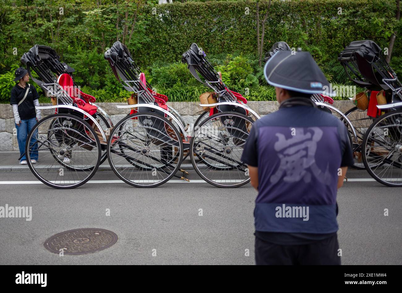 Tokyo, Japan. 25th June, 2024. A rickshaw rider waits for tourists in ...