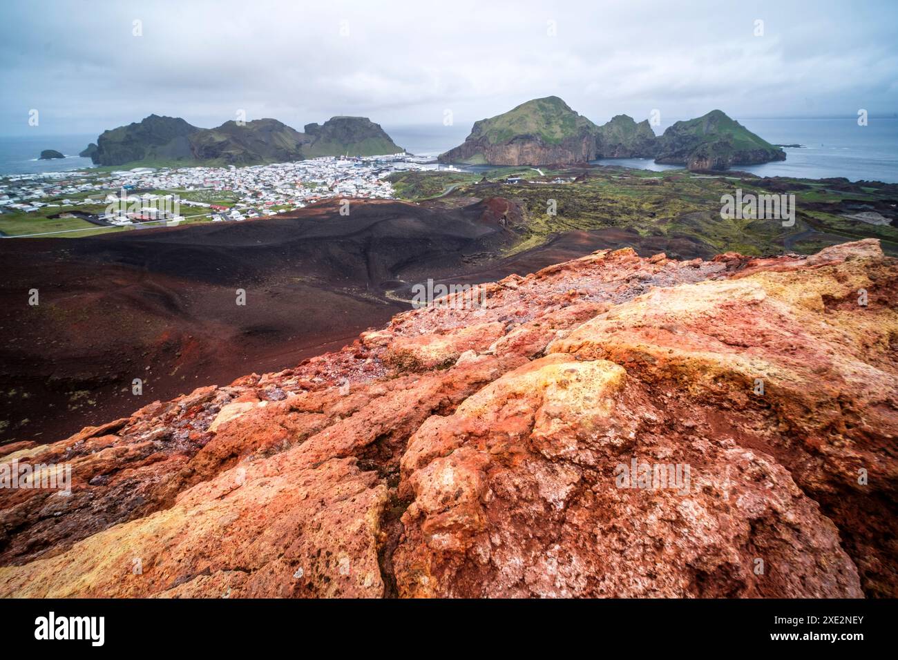 The city of Heimaey and the haven are located at the foot of the