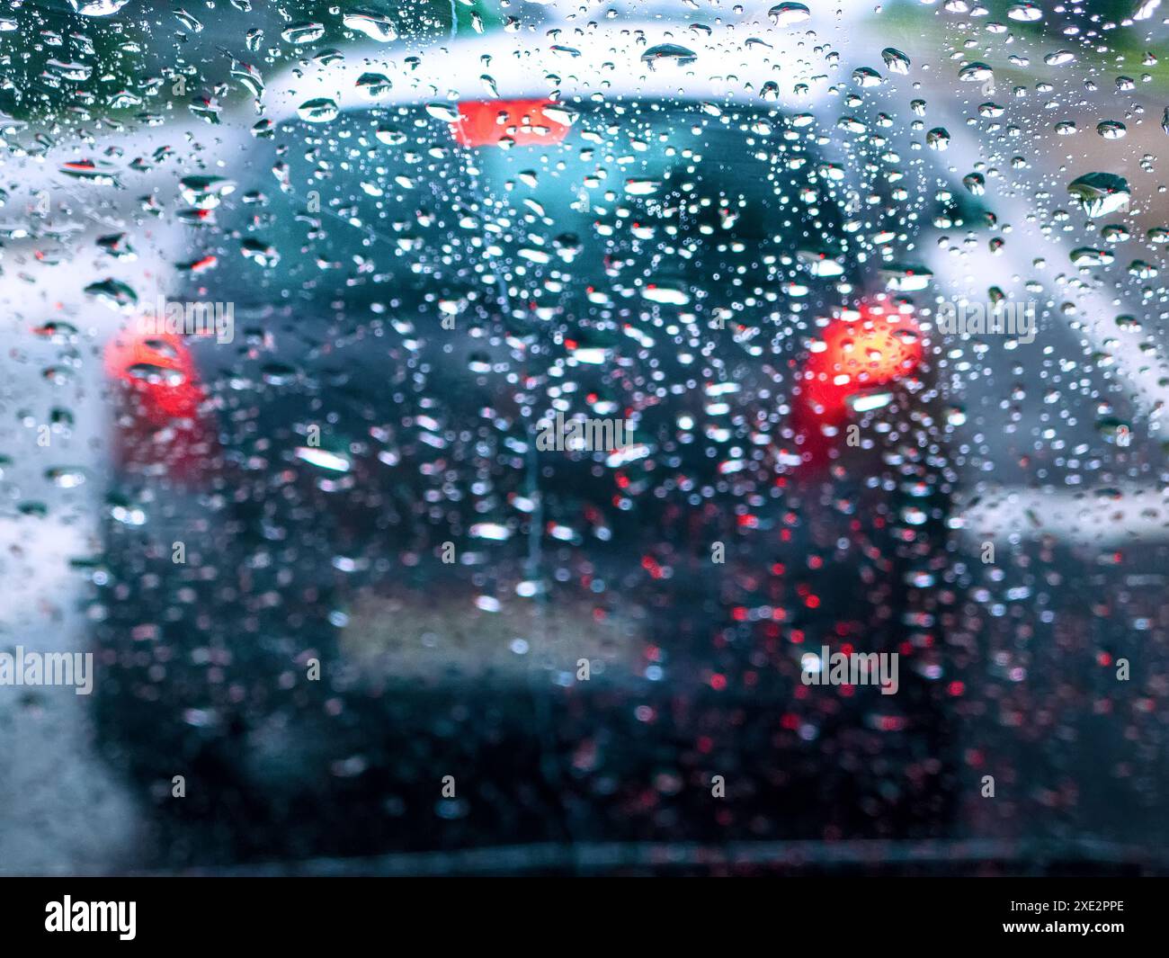 Raindrops on the windshield of a car Stock Photo
