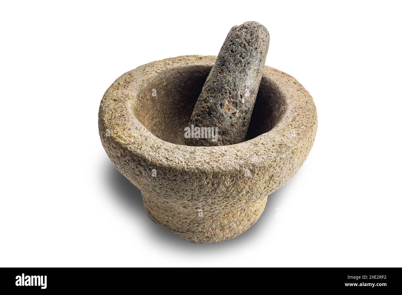 Mortar With Rocks High angle view of empty rock mortar with pestle isolated on white ...