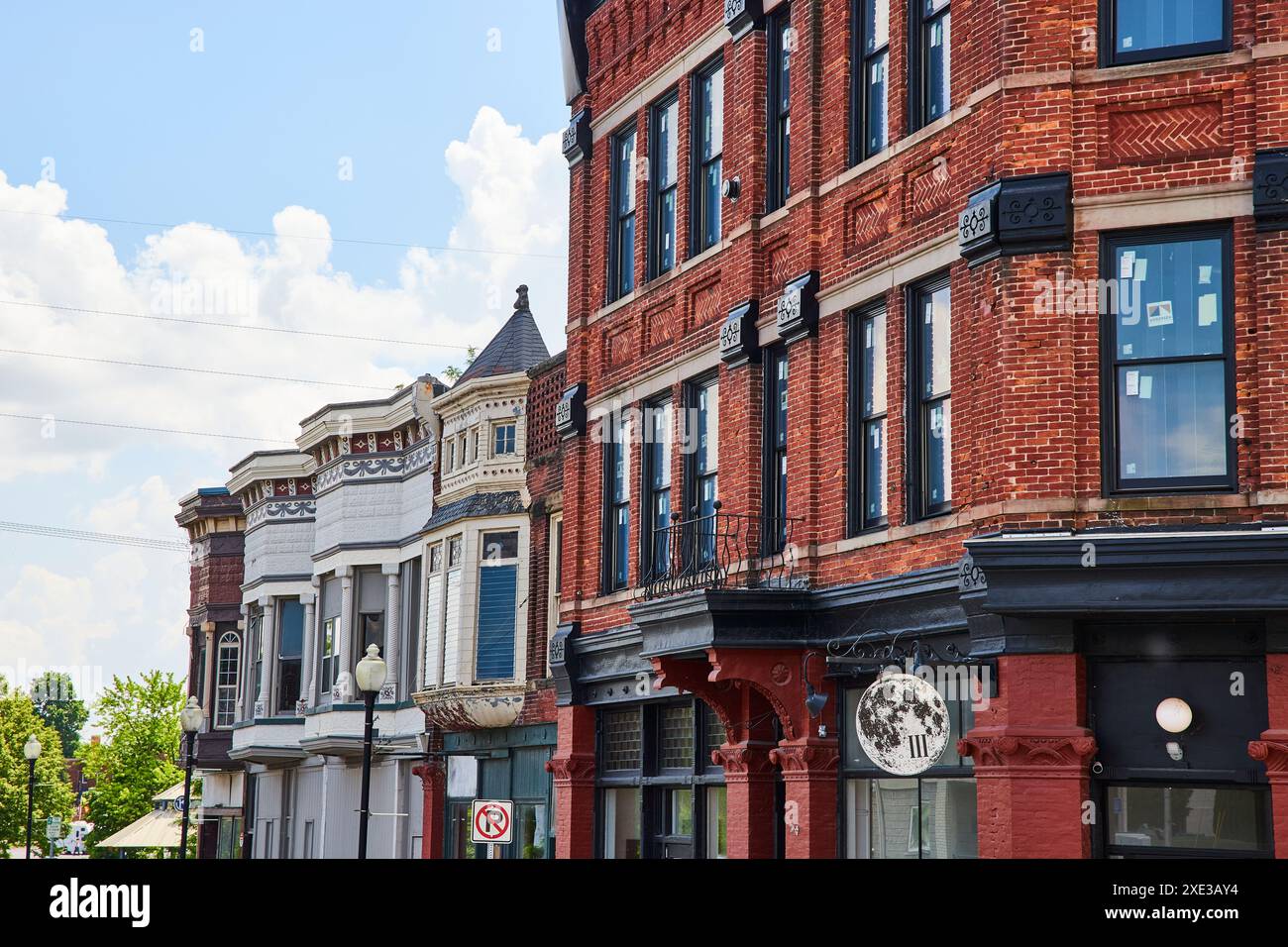 Victorian Facades on Sunny Day Street Level View Stock Photo