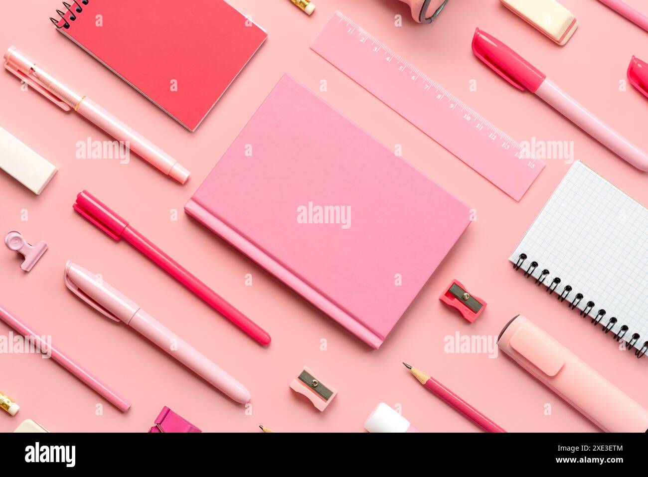 Composition with school supplies over pink background. Back to school concept Stock Photo