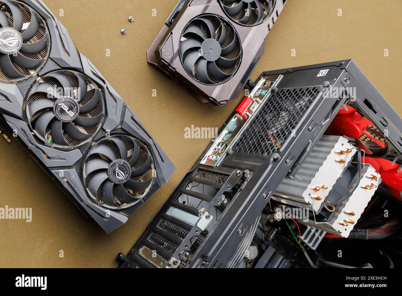 Graphics card upgrading concept, two gaming graphics cards near desktop ...