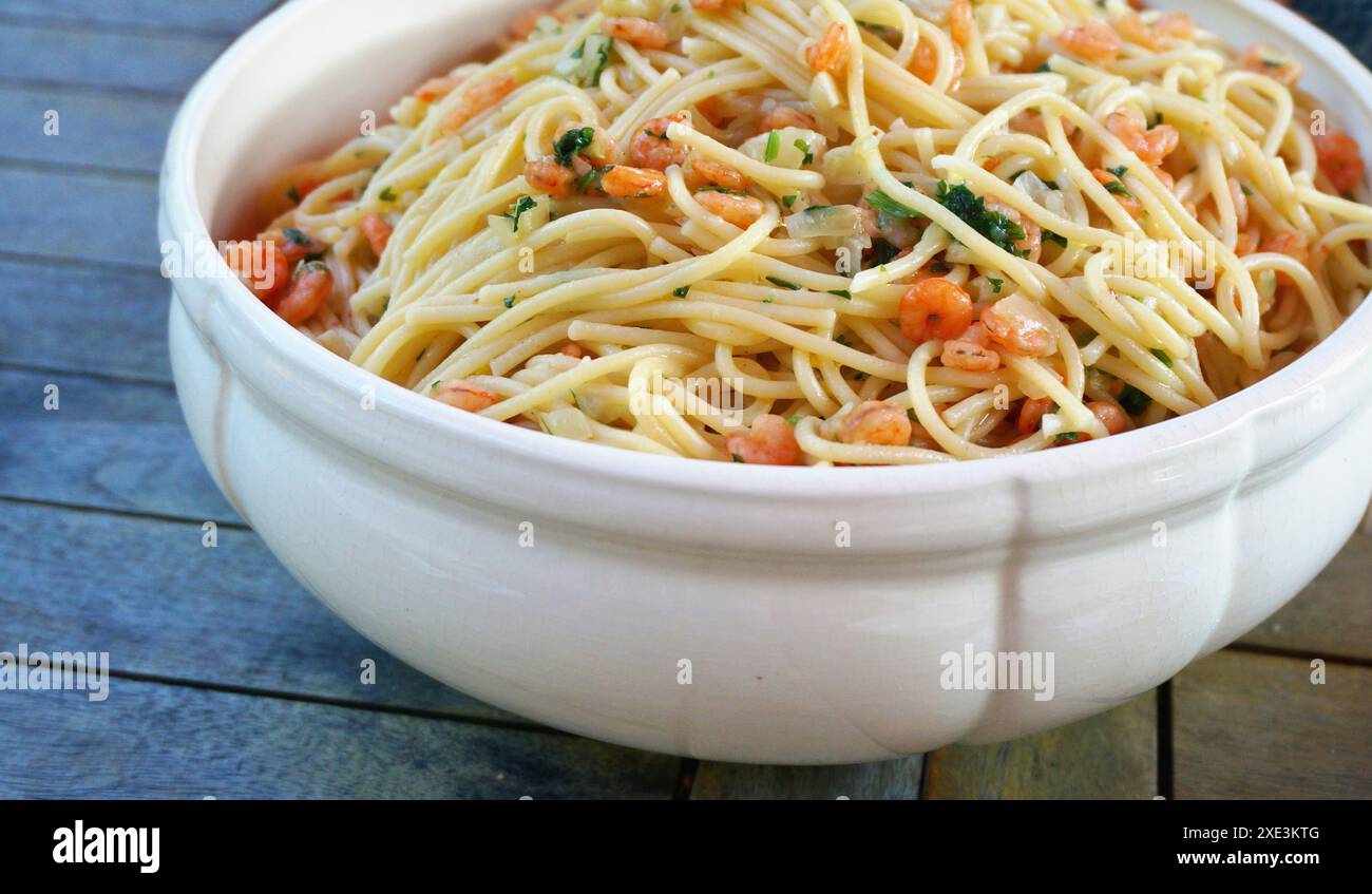 Spaghetti pasta with garlic, shrimps and olive oil. Spaghetti aglio