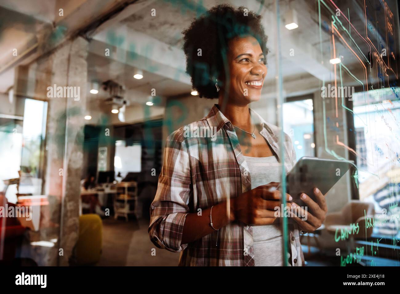 Software, coding and business woman on tablet thinking of data analytics, digital technology. Stock Photo