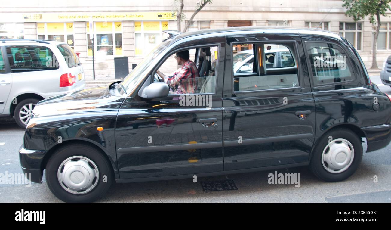 London taxi, black cab on Woburn Place, Bloomsbury, London Stock Photo