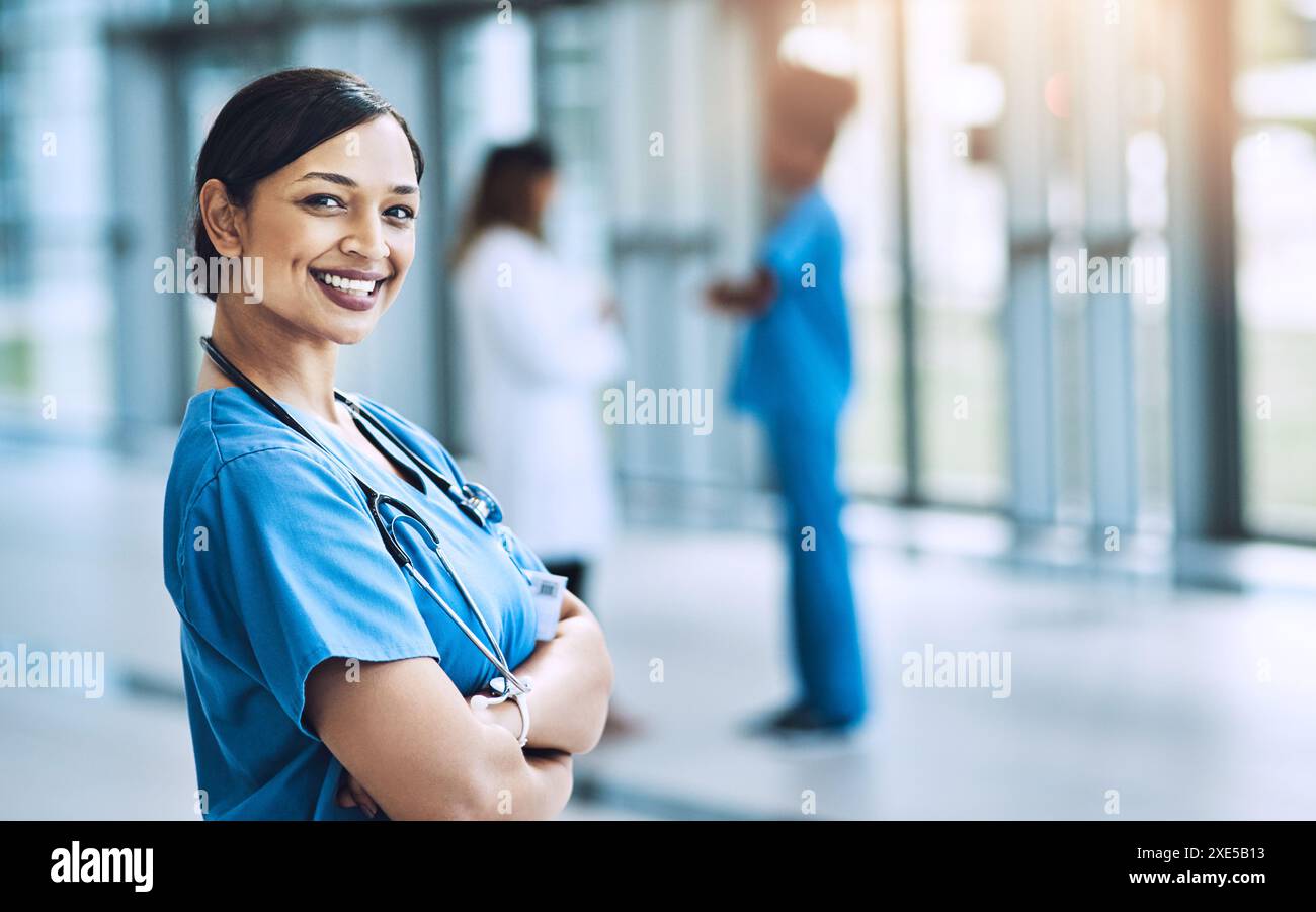 Smile, crossed arms and nurse in hospital for medical career with ...