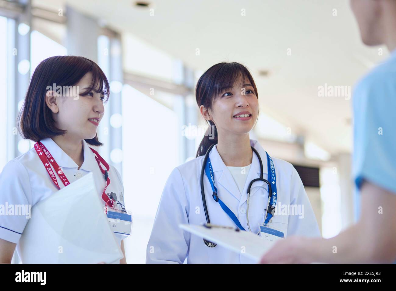 Female nurse doctor speaking hi-res stock photography and images - Alamy