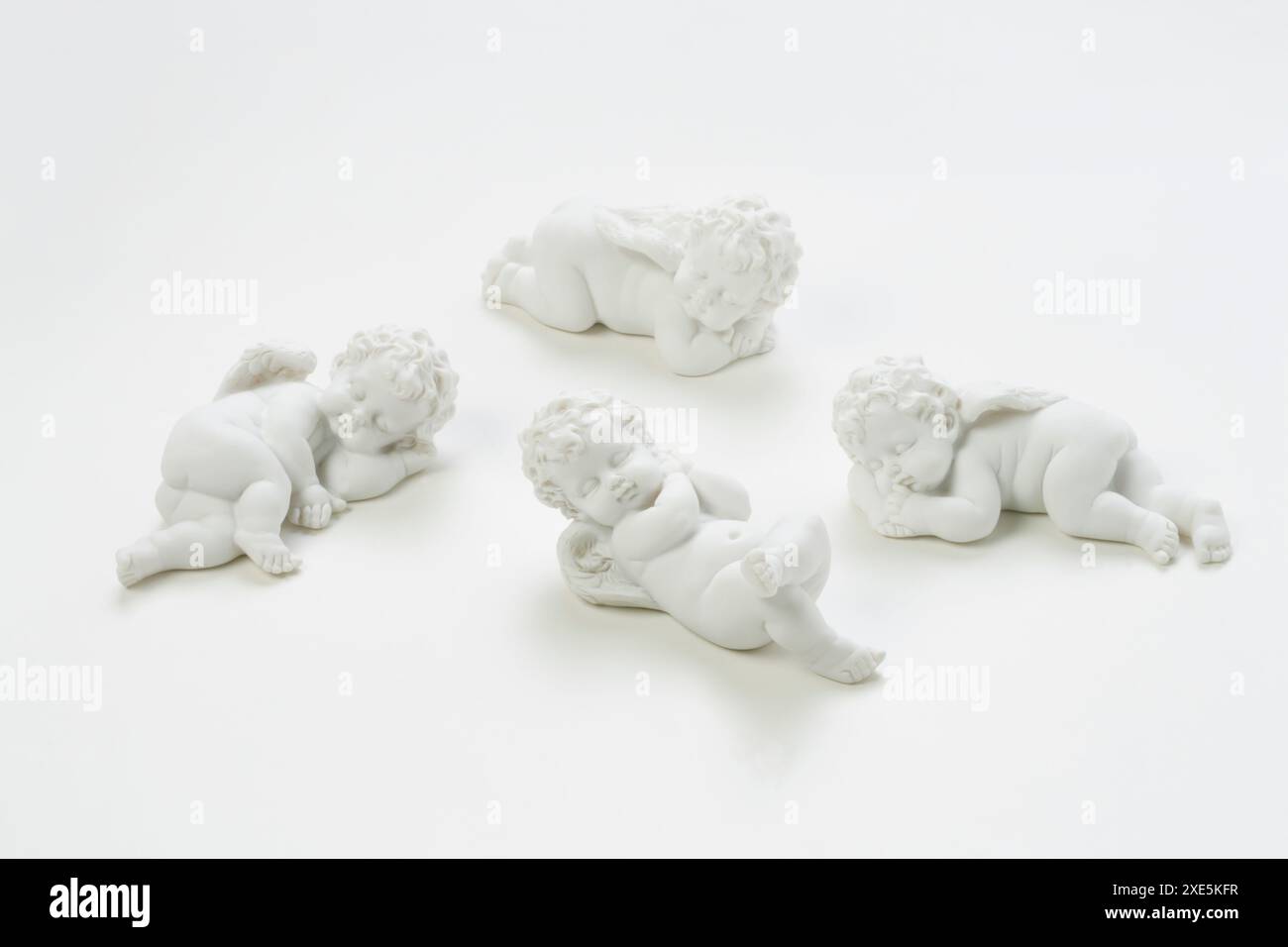 Porcelain angel figurines hi-res stock photography and images - Alamy