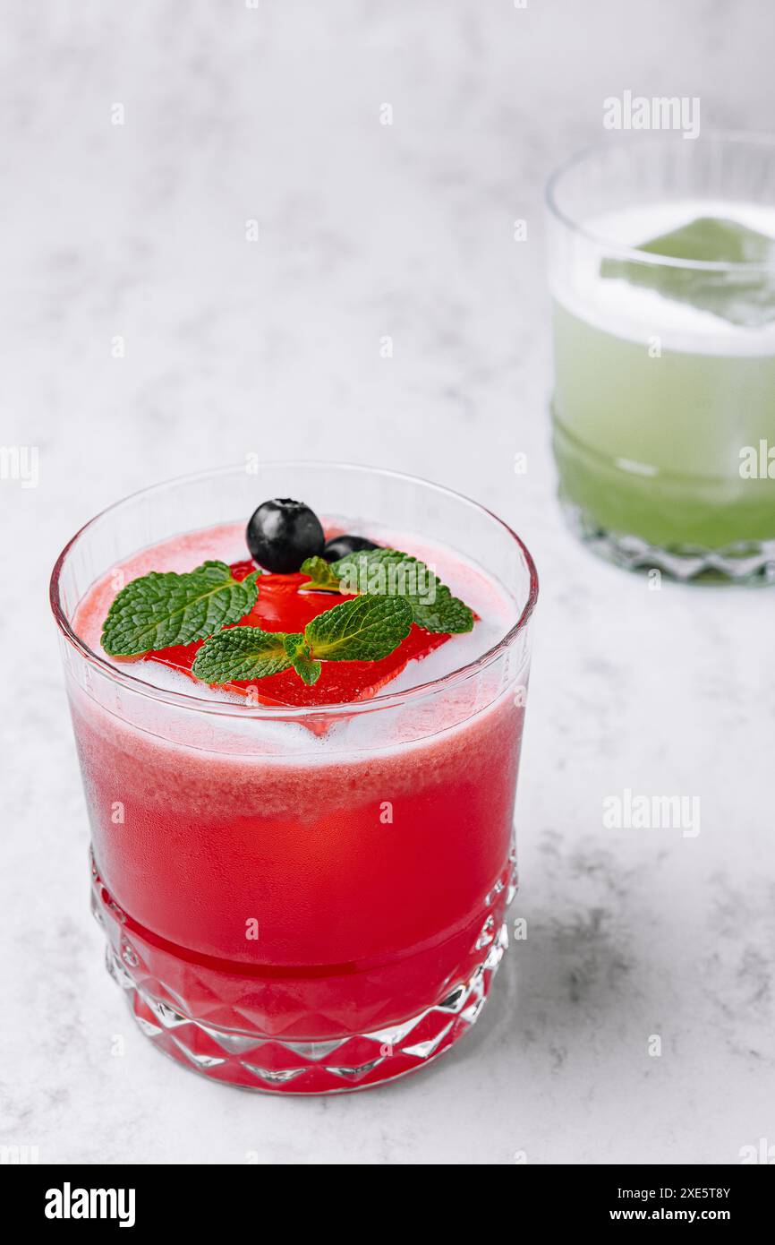 Refreshing Boozy Vodka Cranberry Cocktail with ice cube Stock Photo