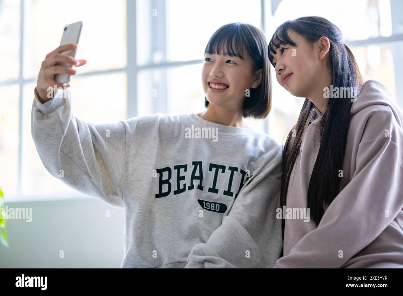 Girl taking selfie Stock Photo