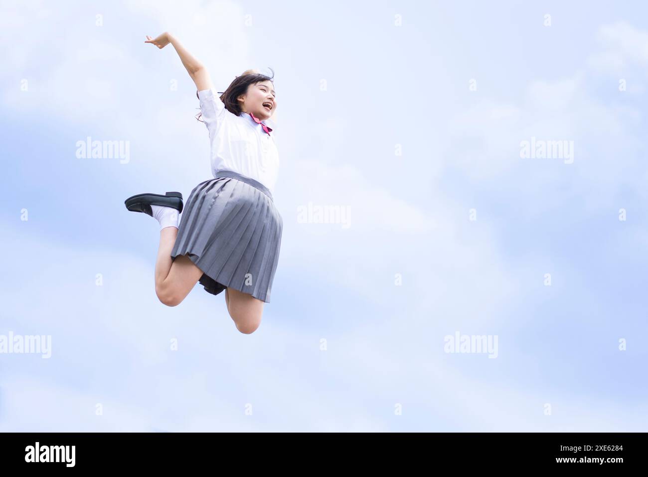 High school girls jumping Stock Photo - Alamy