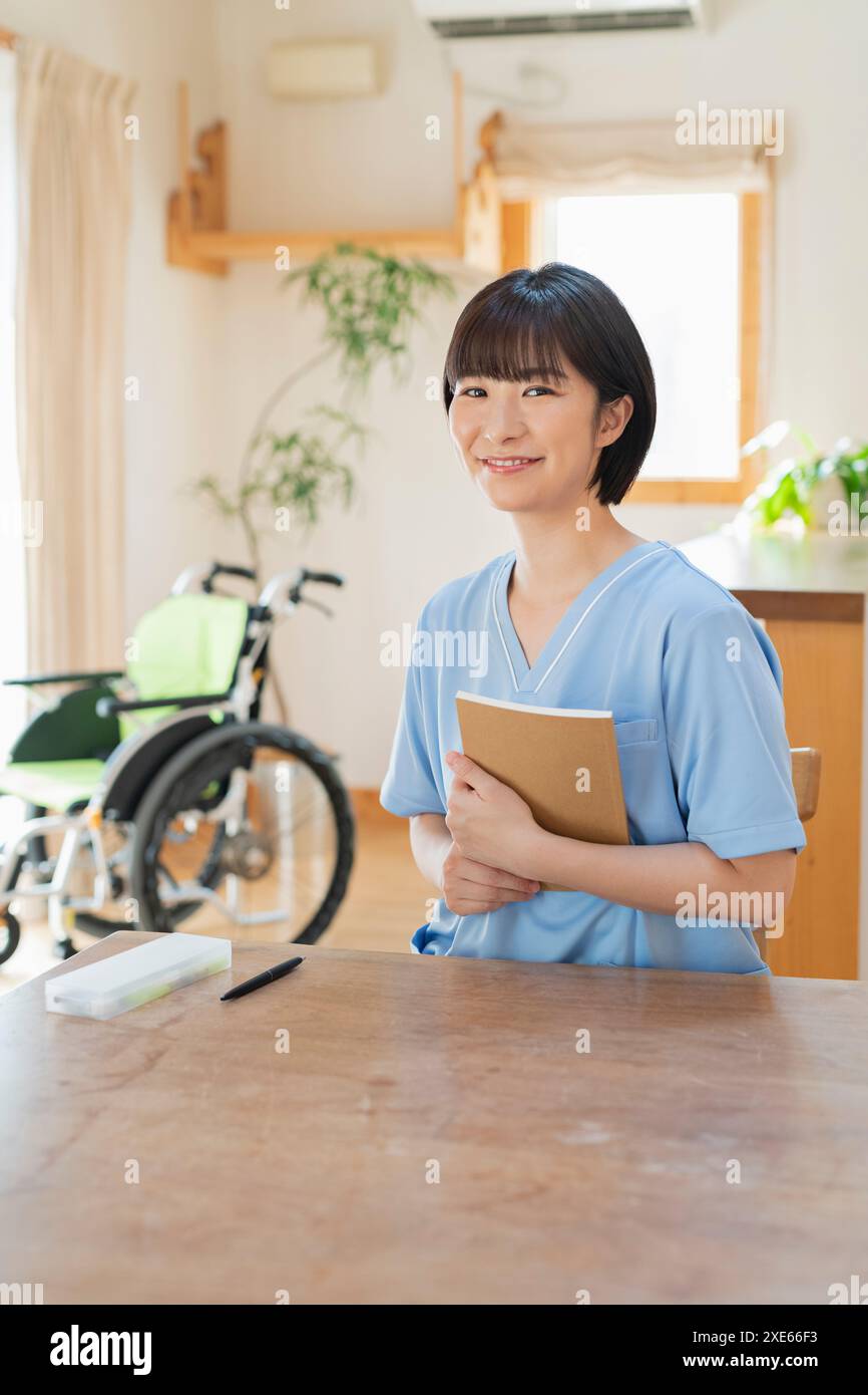Asian female doctor write hi-res stock photography and images - Alamy