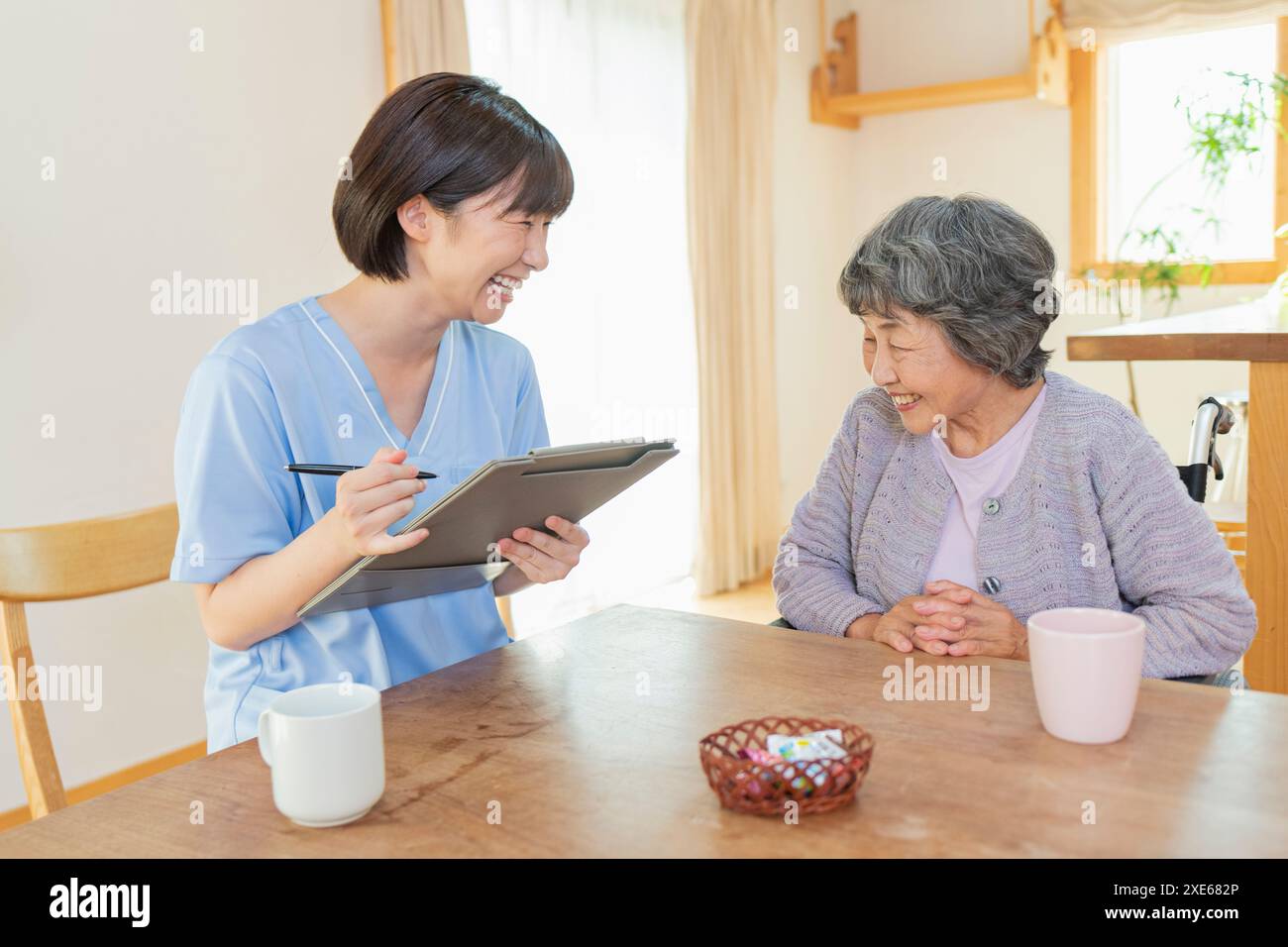 Asian female wheelchair user hi-res stock photography and images - Alamy