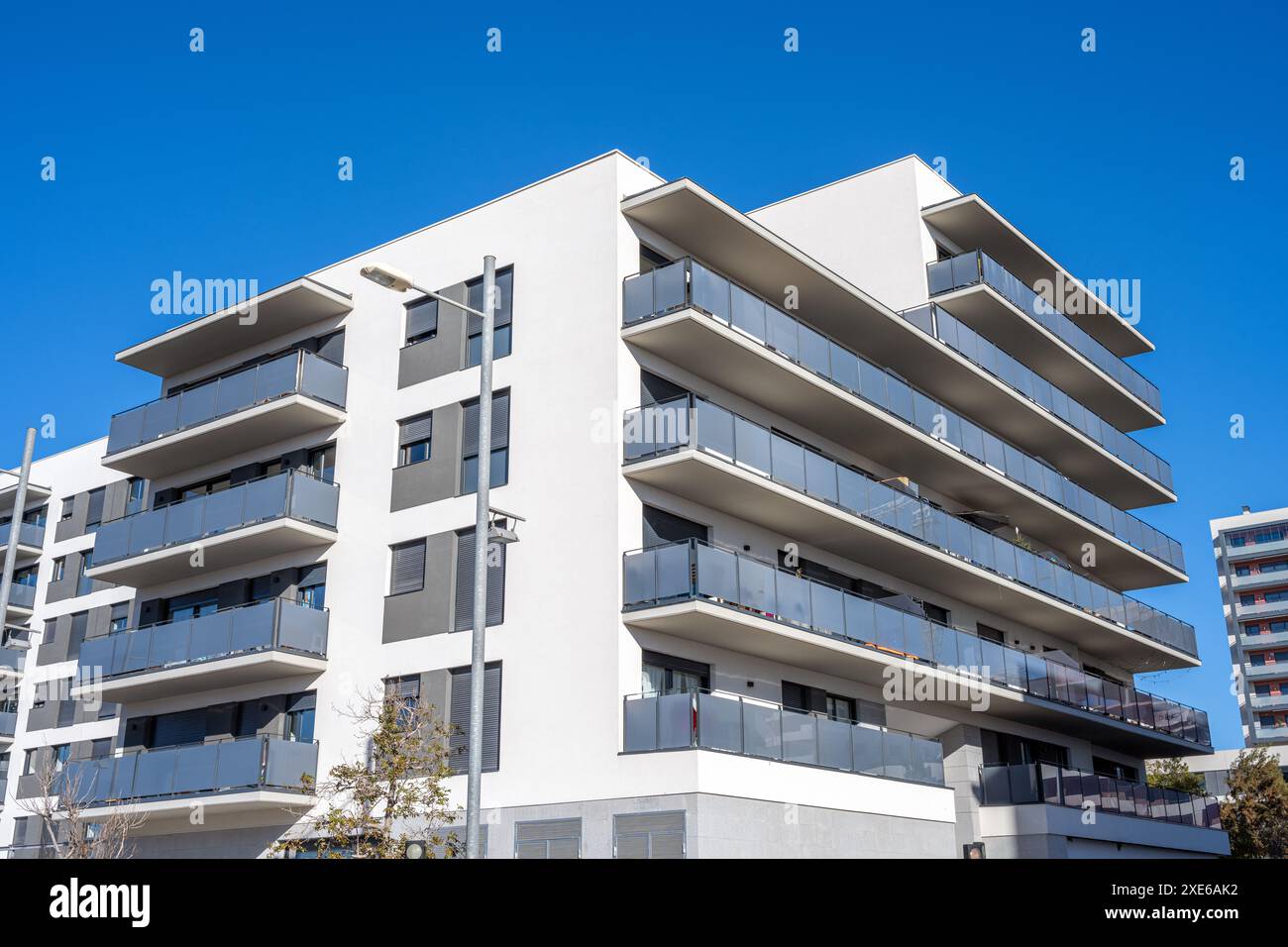 Modern white apartment building with balconies seen in Barcelona, Spain ...