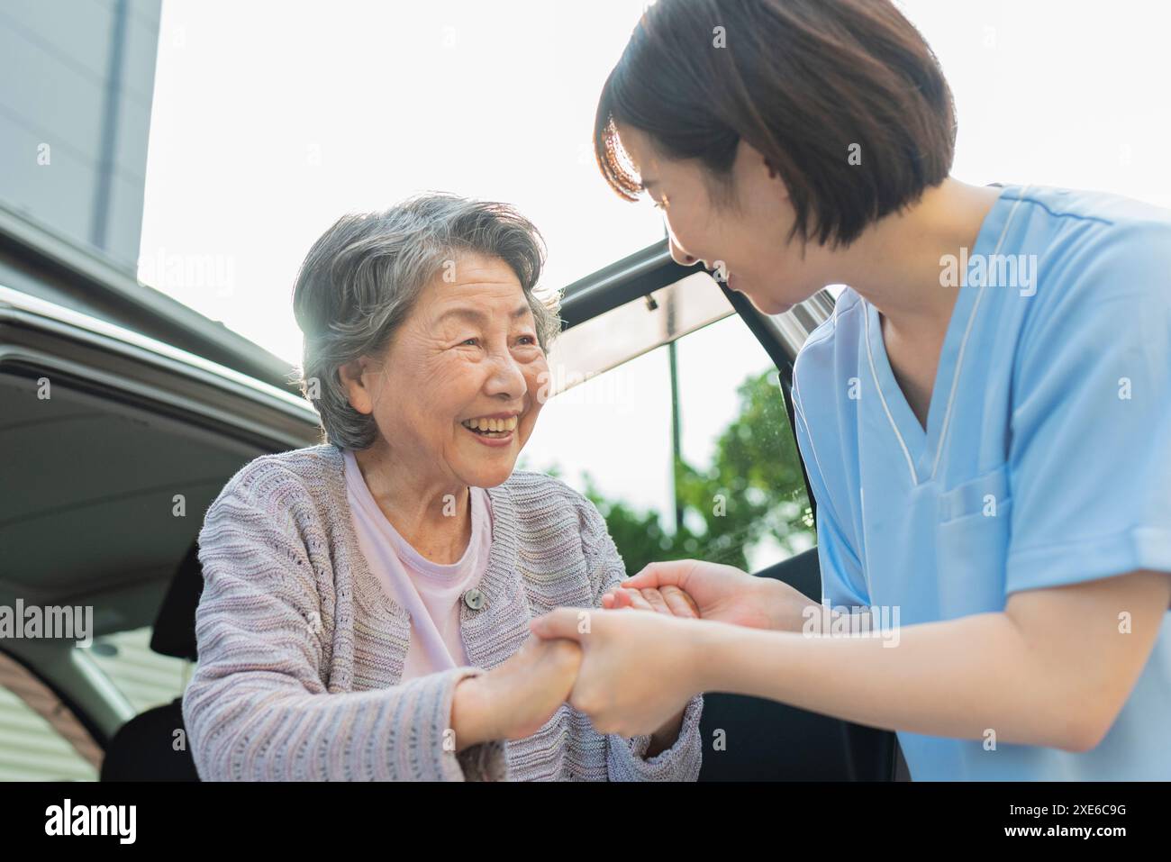 Asian female doctor helping elderly hi-res stock photography and images ...