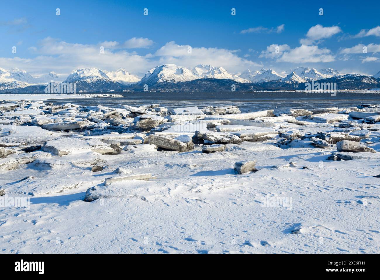 Ice floes in Kachemak Bay with the Kenai Mountains in the background. Near Homer on the Kenai Peninsula, Alaska, USA Stock Photo