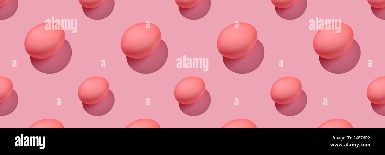 Easter composition pattern in pink shades. Painted eggs on a pink background. Stock Photo