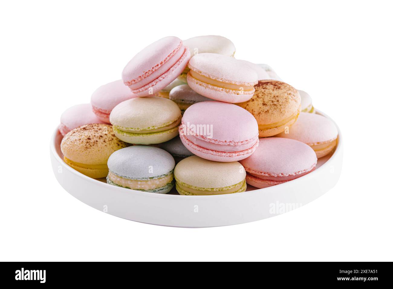 Multicolored macaroons on ceramic plate isolated on white Stock Photo