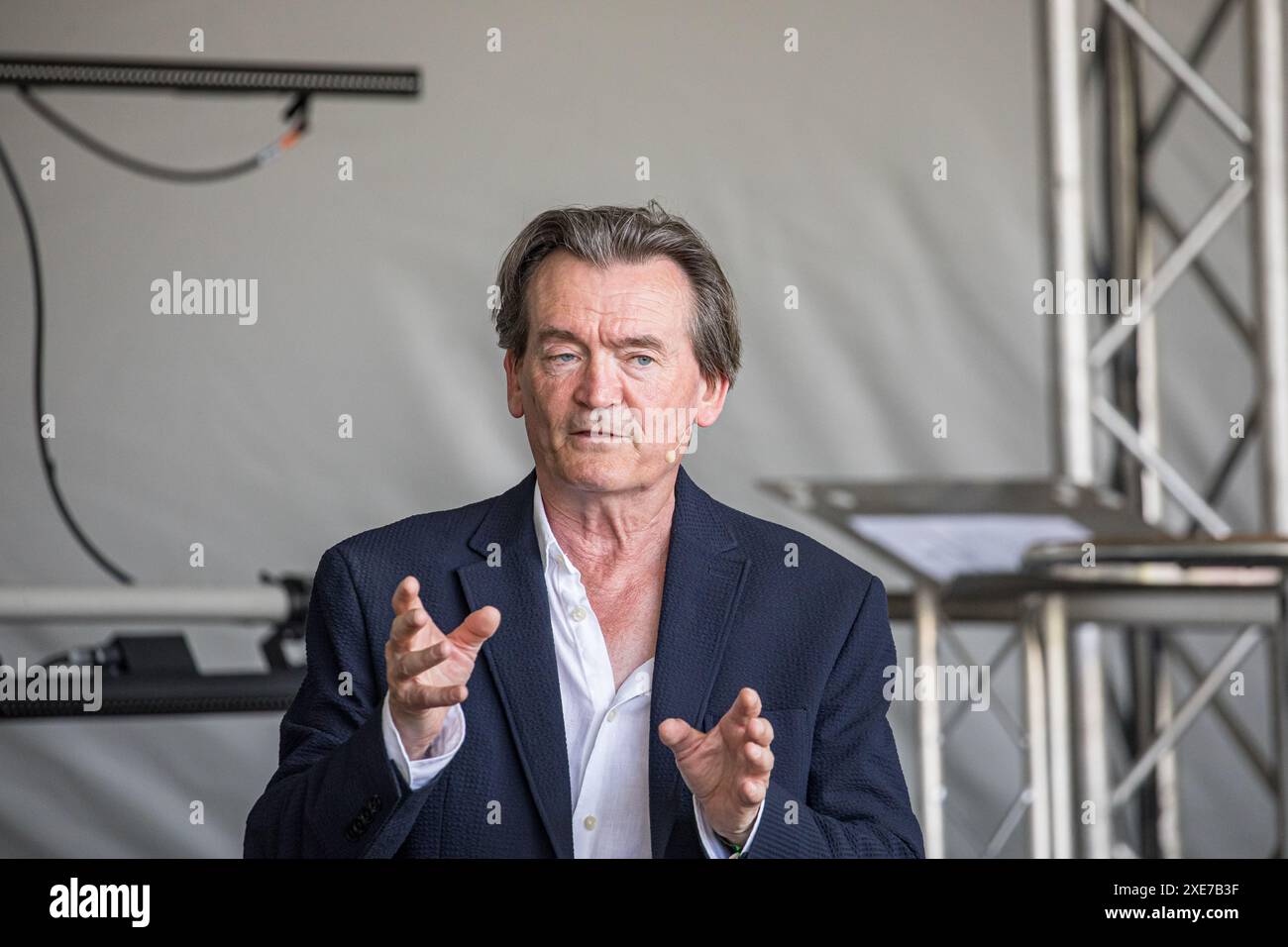 BROADCHALKE, WILTSHIRE, UK, 26th June, 2024, Feargal Sharkey talks about the importance of the Chalk Stream at Chalke History Festival, the UK's leading history festival. The event attracts hundreds of thousands of history enthusiasts, including tens of thousands of school children. Credit John Rose/Alamy Live News Stock Photo
