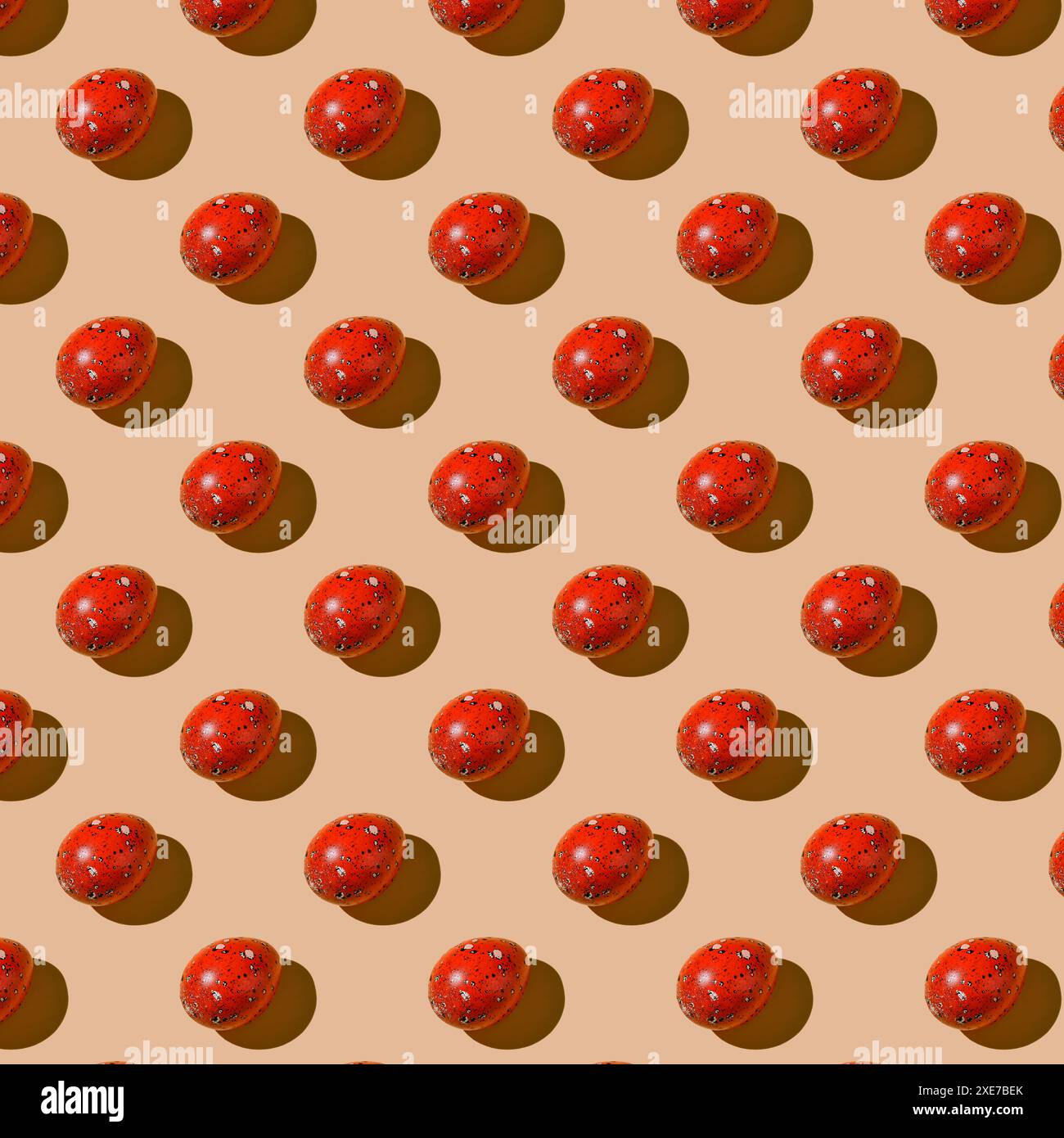 Easter composition pattern. Painted red eggs on a beige background. Stock Photo