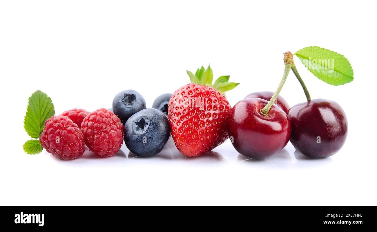 Cherry, raspberry, blueberries, strawberry in close up on white backgrounds. Stock Photo