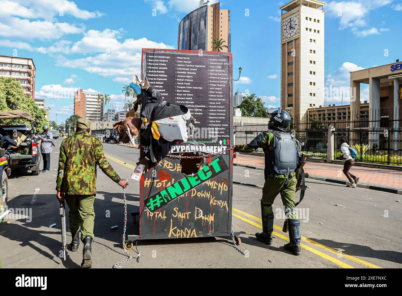 Anti-riot police clear parliament road, during the demonstration. Young ...