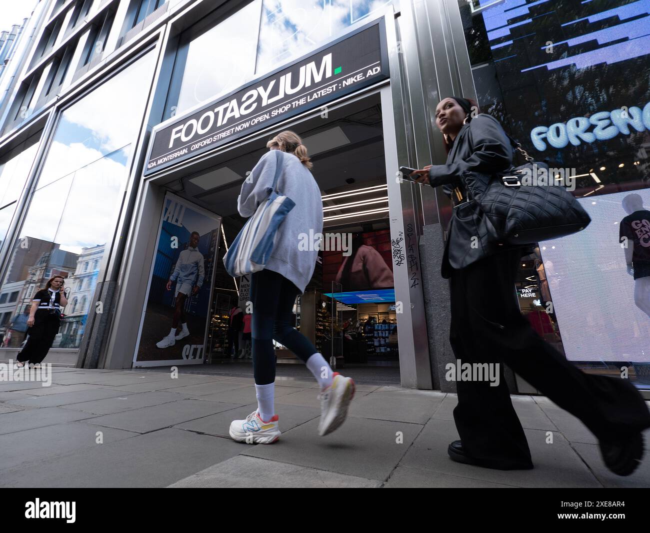 FootAsylum , retailers of fashion streetwear and sportswear, Oxford Street store, shop Stock Photo