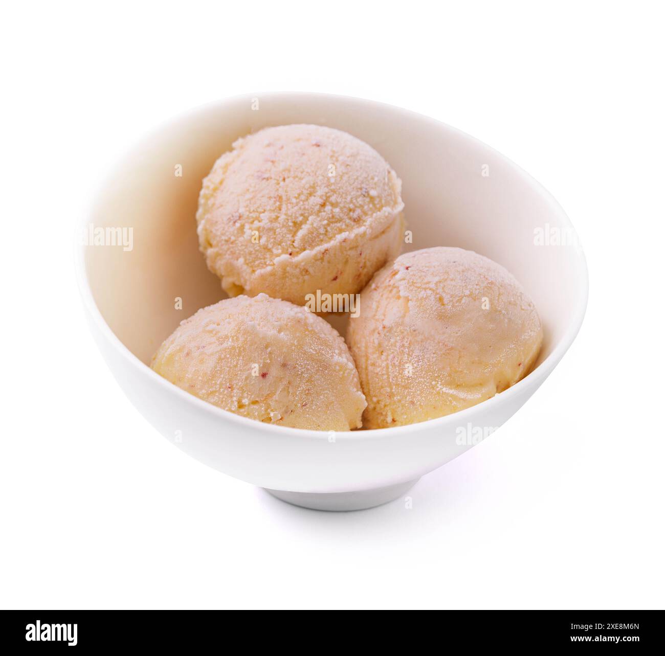 Three balls of vanilla-banana ice cream in white bowl Stock Photo