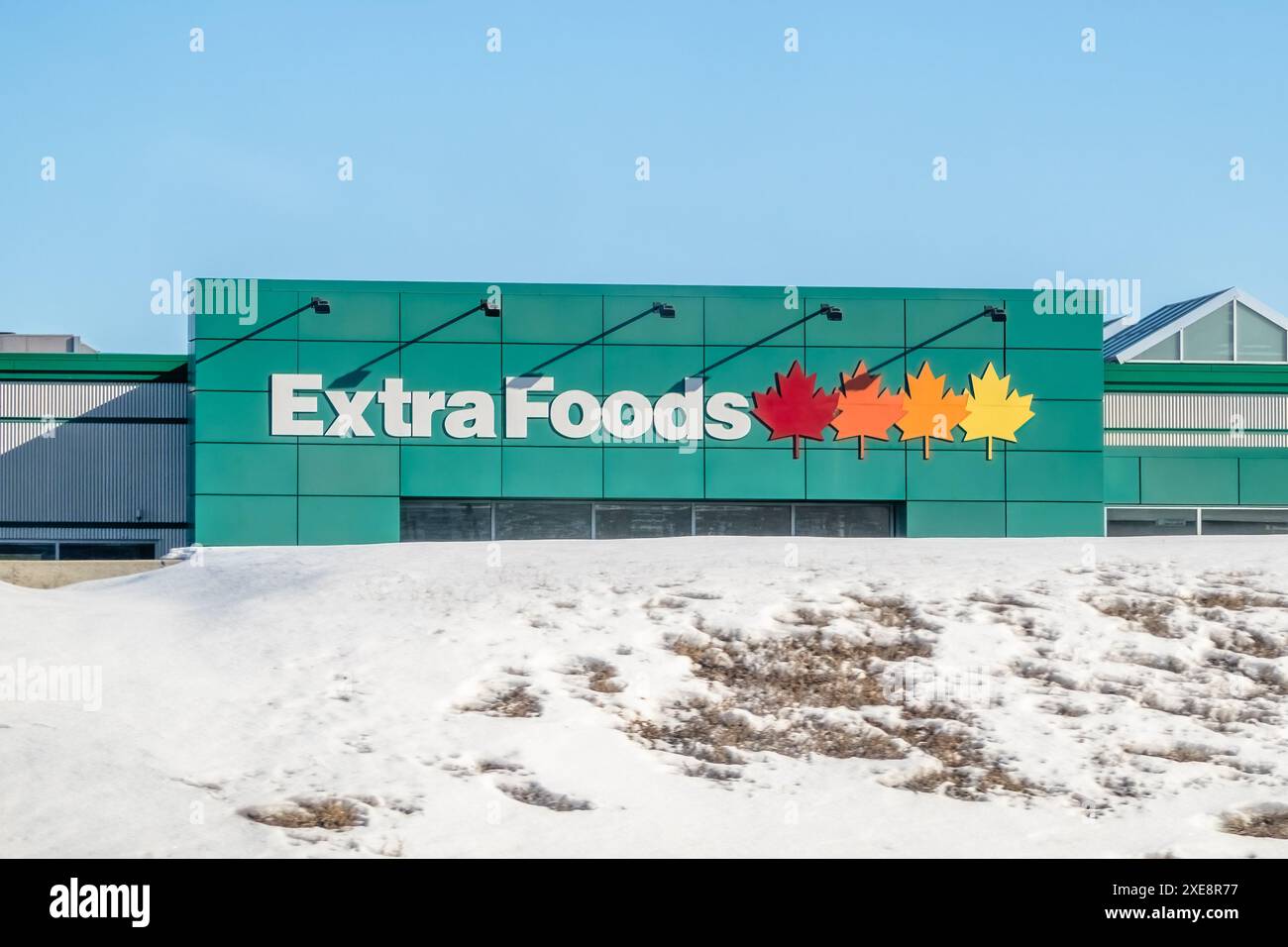 Drumheller, Alberta, Canada. Feb 19, 2024. An Extra Foods sign