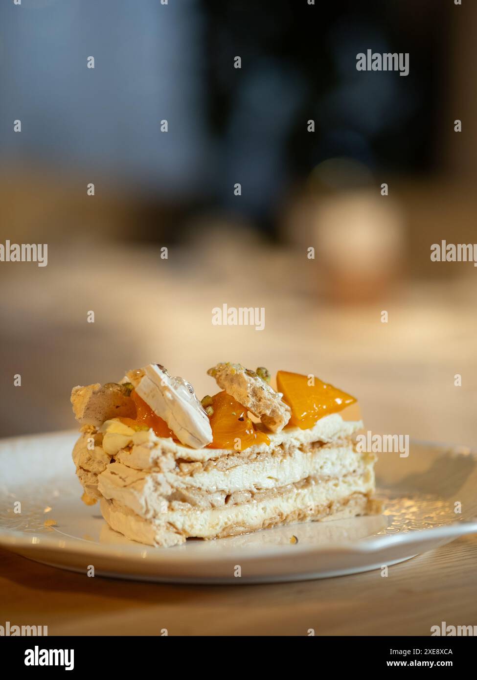 Cake with cream-cheese and persimmons Stock Photo