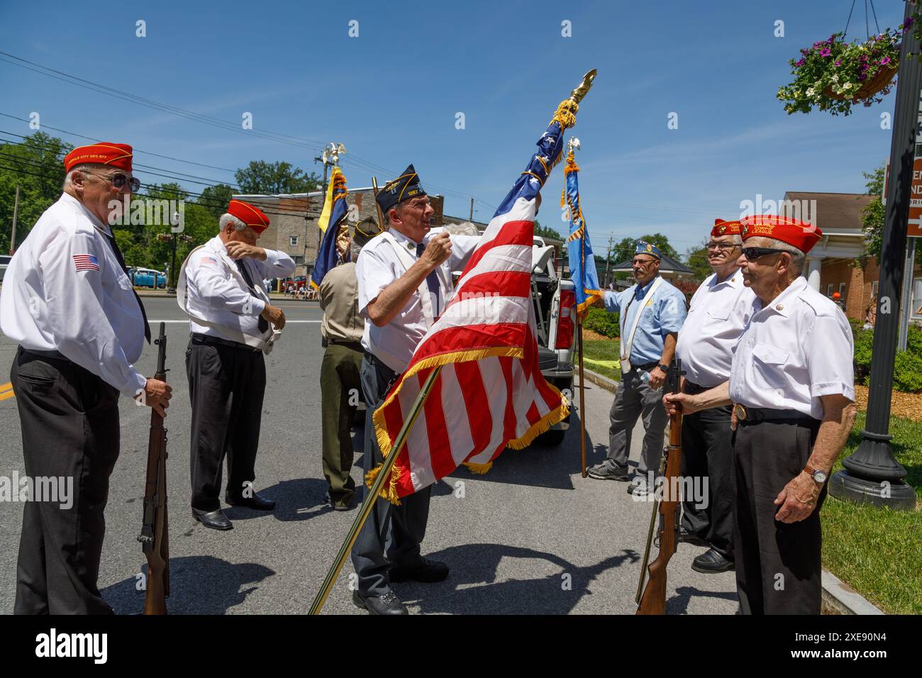 Veterans prepare flags at Ozfest. annual festival and parade in Canastota, New York, birthplace of L. Frank Baum, who wrote The Wizard of Oz. Stock Photo