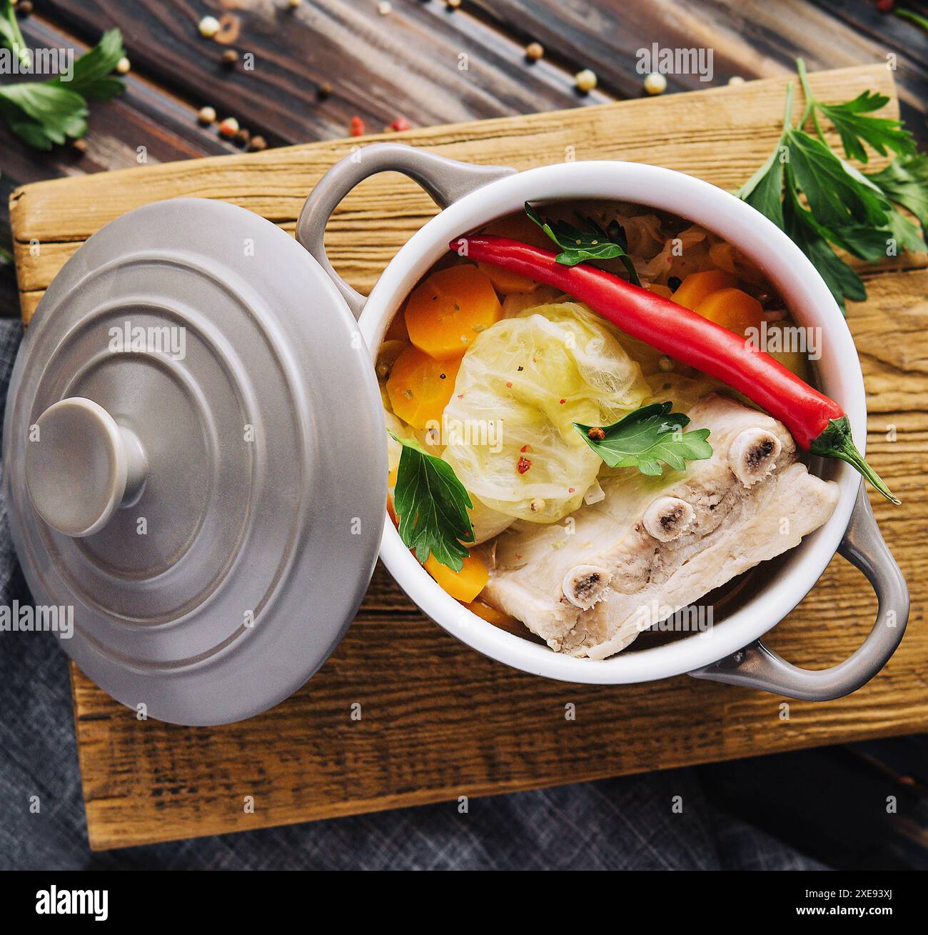 Pickled cabbage soup with carrots and pork ribs Stock Photo