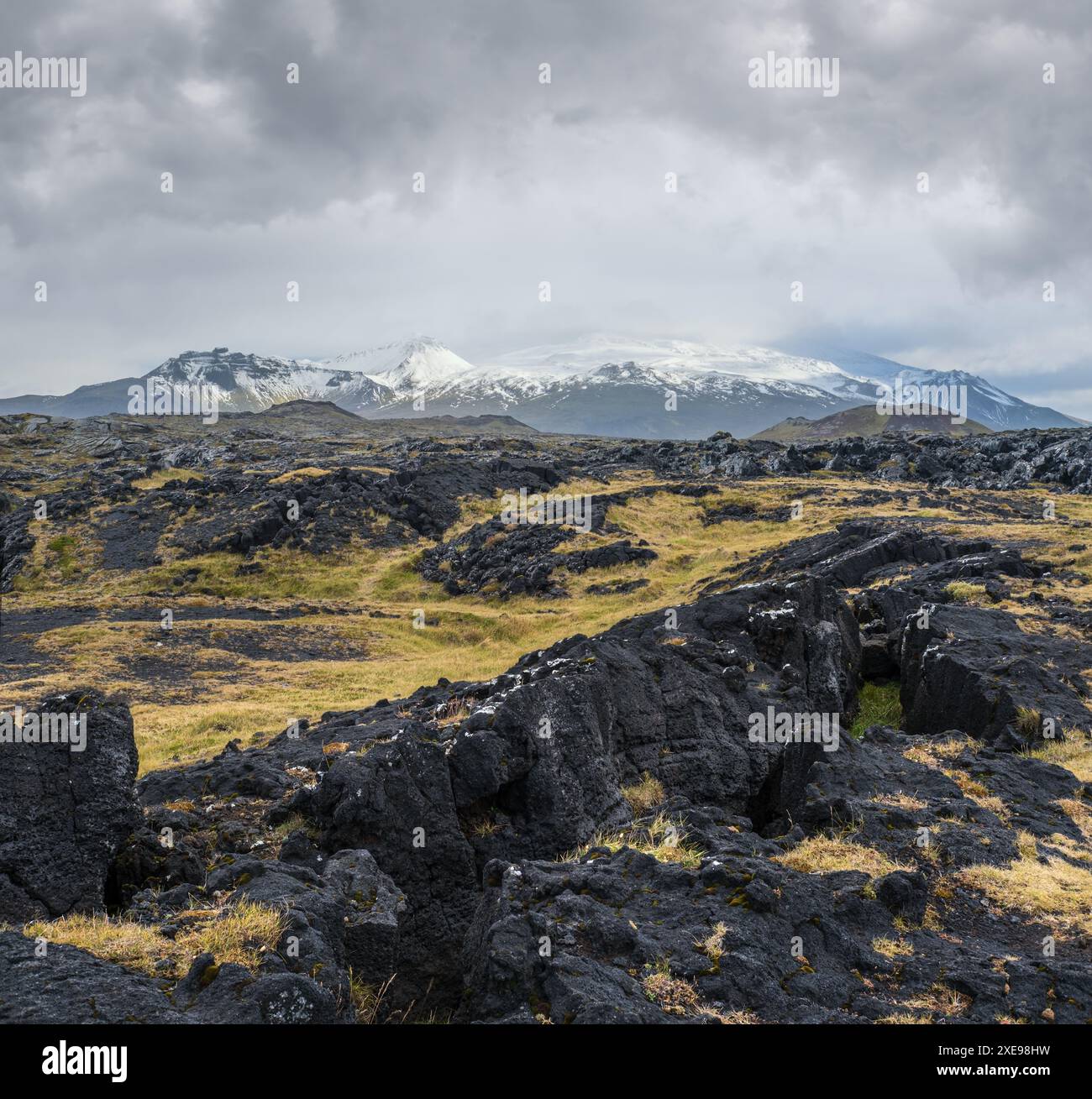 View during auto trip in West Iceland, Snaefellsnes peninsula, View Point near Svortuloft Lighthouse. Spectacular black volcanic Stock Photo