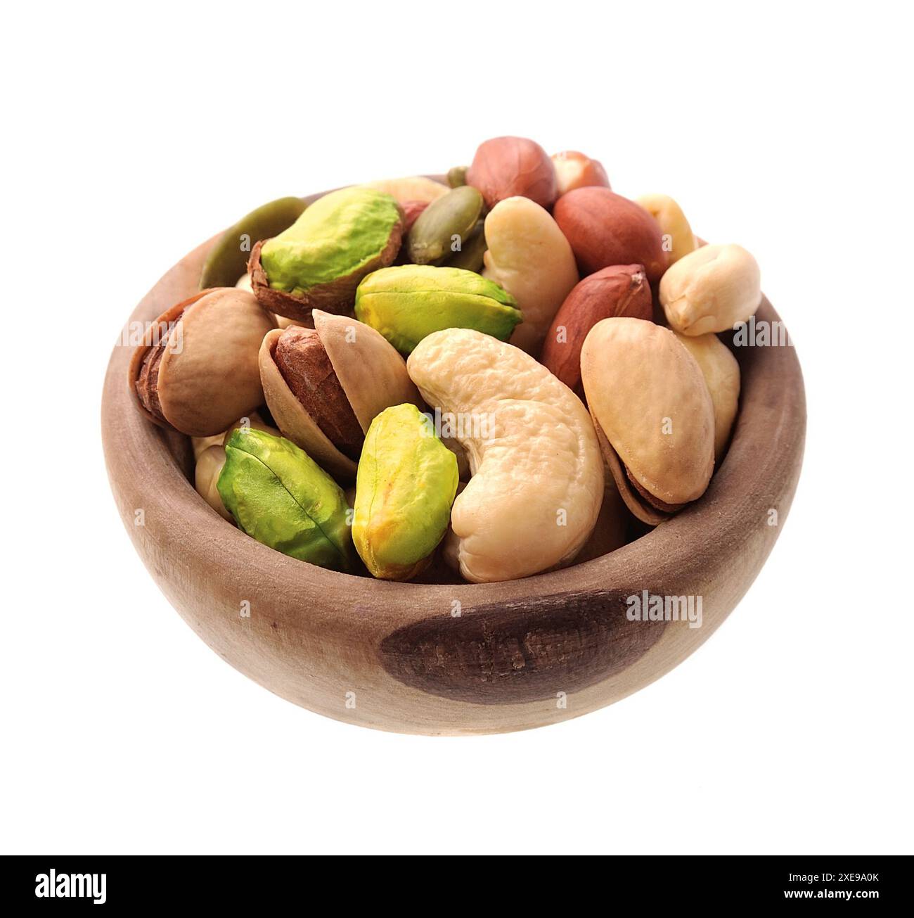 Mix nuts in wooden plate Stock Photo