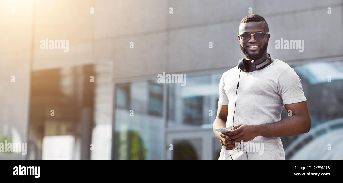 Man Using Phone in City Stock Photo