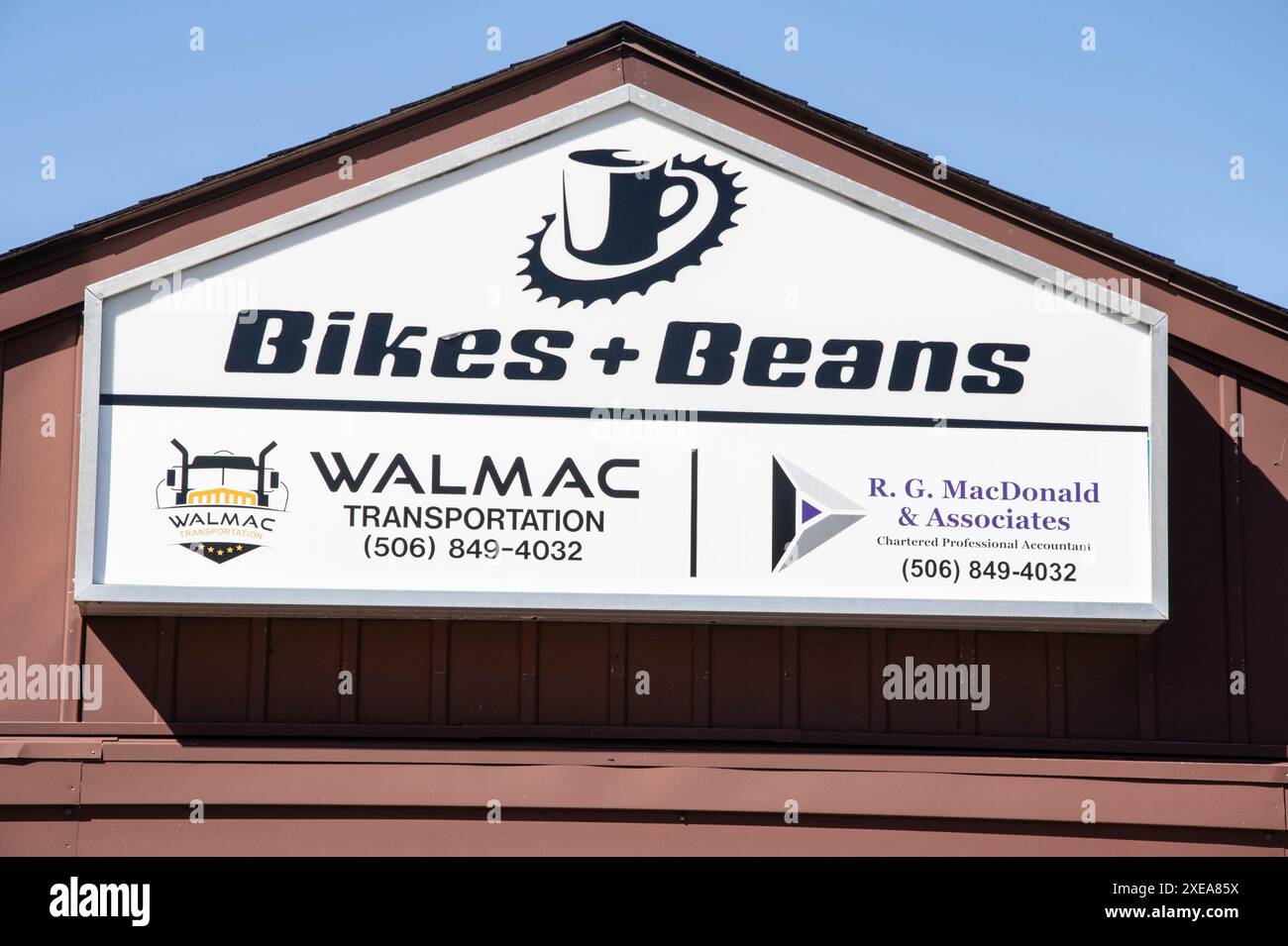 Bikes & Beans store and coffee shop sign on Landing Court in Quispamsis, New Brunswick, Canada Stock Photo